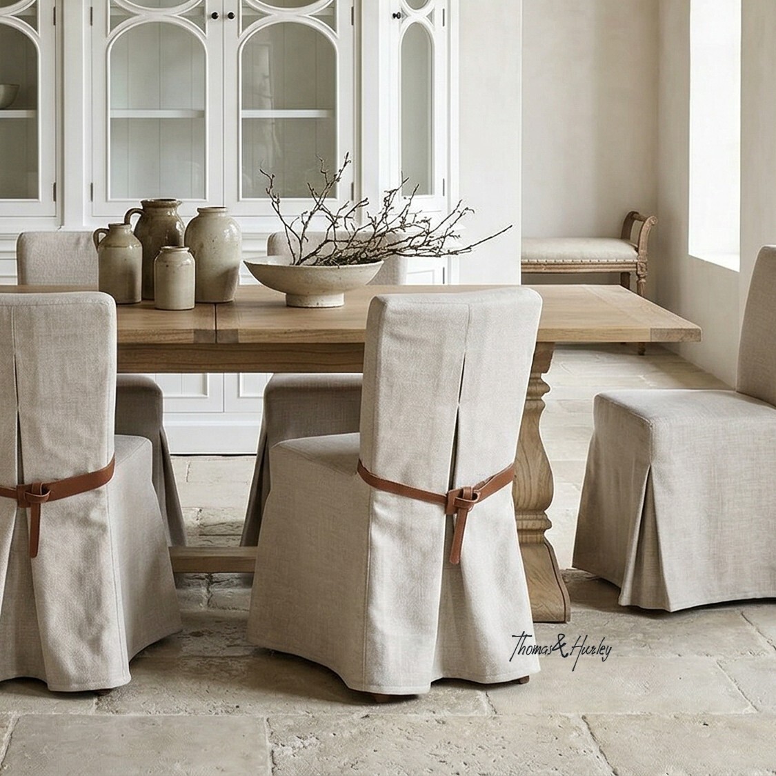 Carlyle dining chair with tailored slipcover design, soft upholstery and timeless silhouette styled in a warm Australian home