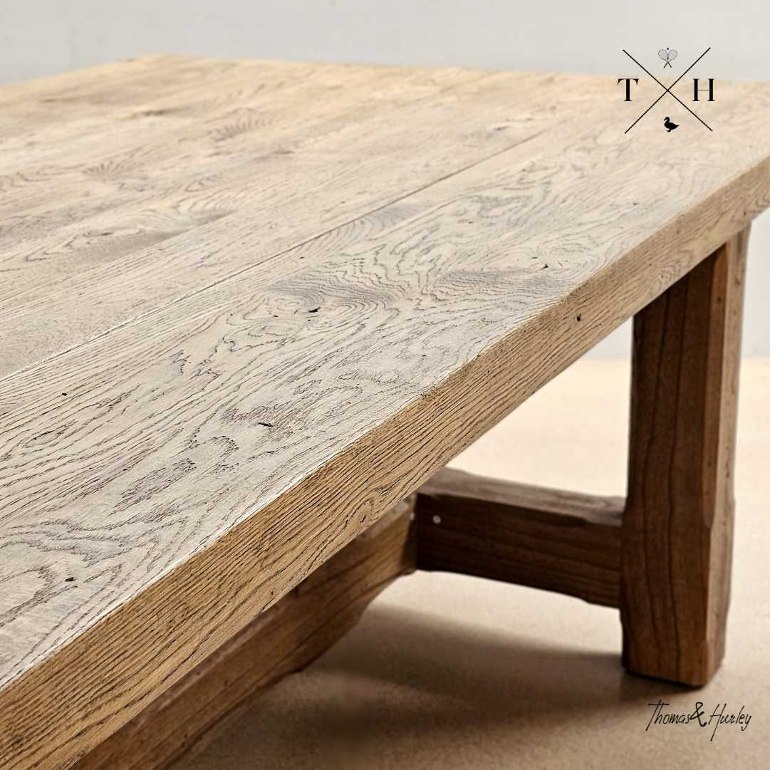 Trailbridge Canyon Oak Dining Table | Natural Timber Grain Detail Trailbridge Canyon oak dining table close-up showing natural timber grain and rustic handcrafted leg detail